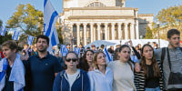 Columbia University students hold hands and participate in a rally and vigil in support of Israel 
