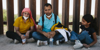 Migrants seeking asylum in the U.S. arrive in Yuma, Arizona